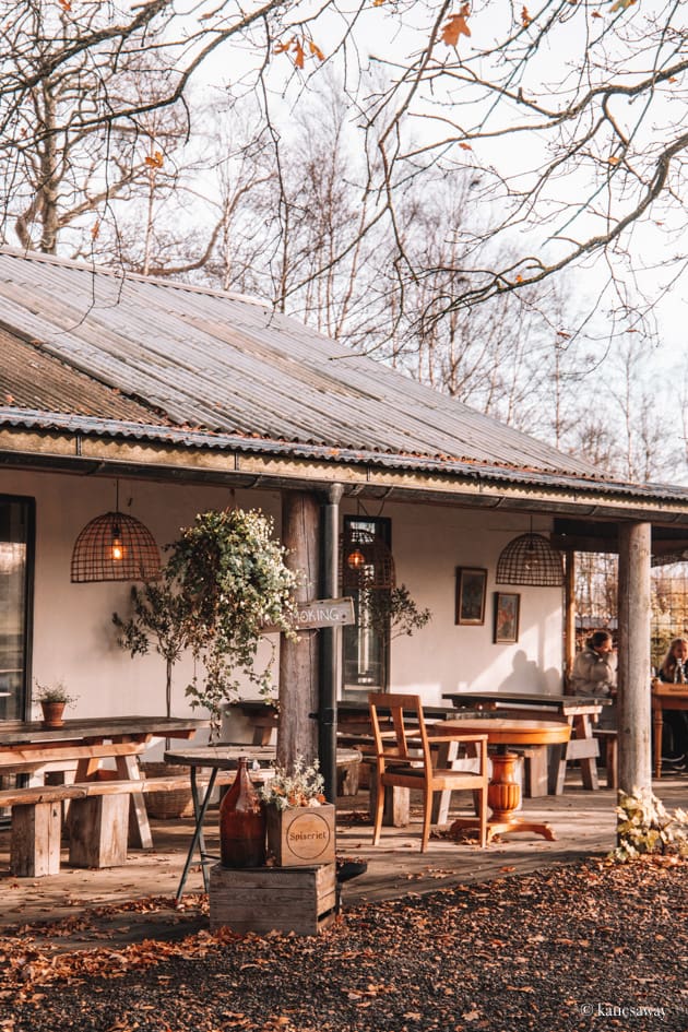 spiseriet restaurant with wooden outdoor furniture on the terrace