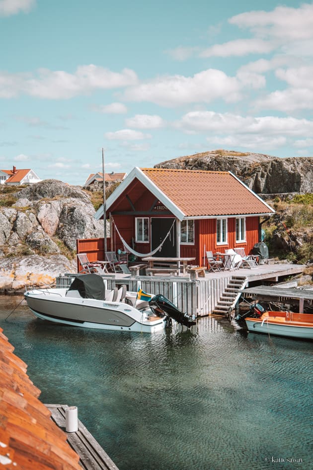 Red wooden boat house by the water on Käringön Sweden