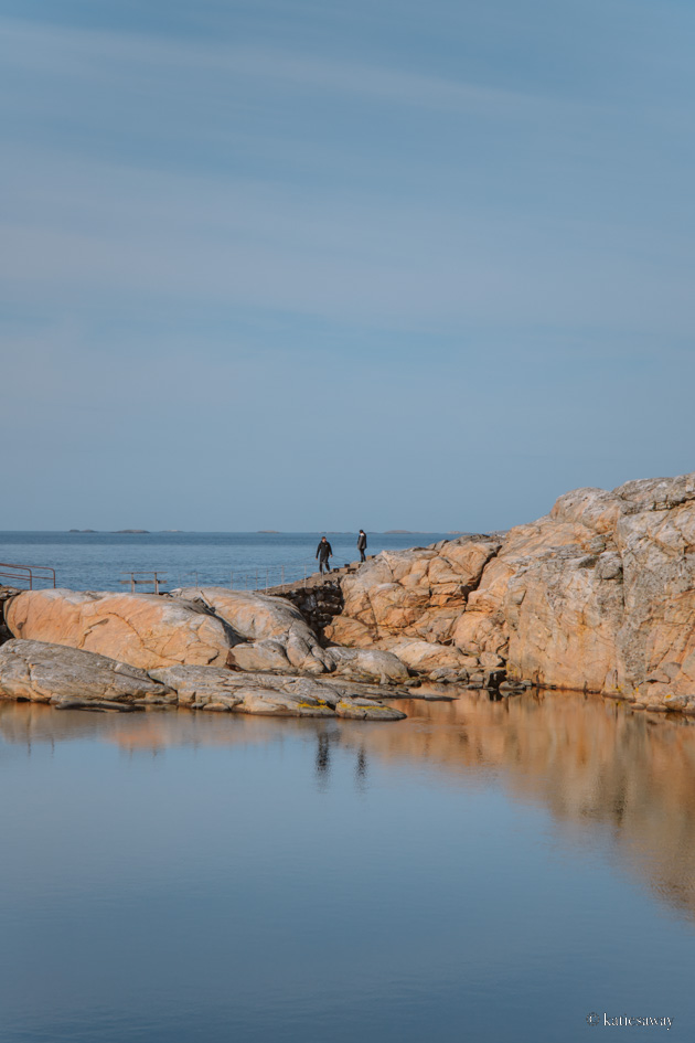 Two people walking along the rocky path in Marstrands Nature Reserve