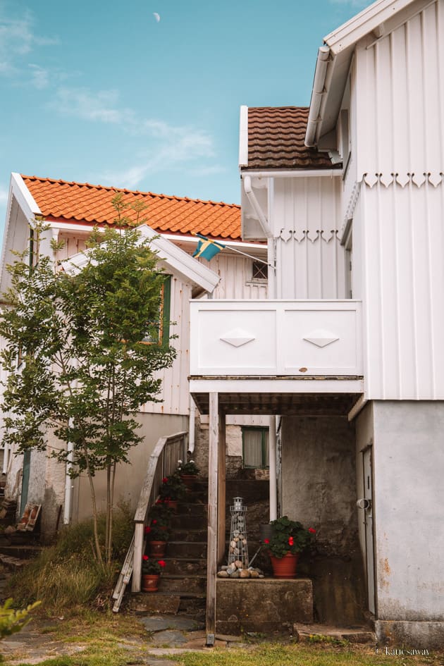 wooden white house in åstol village