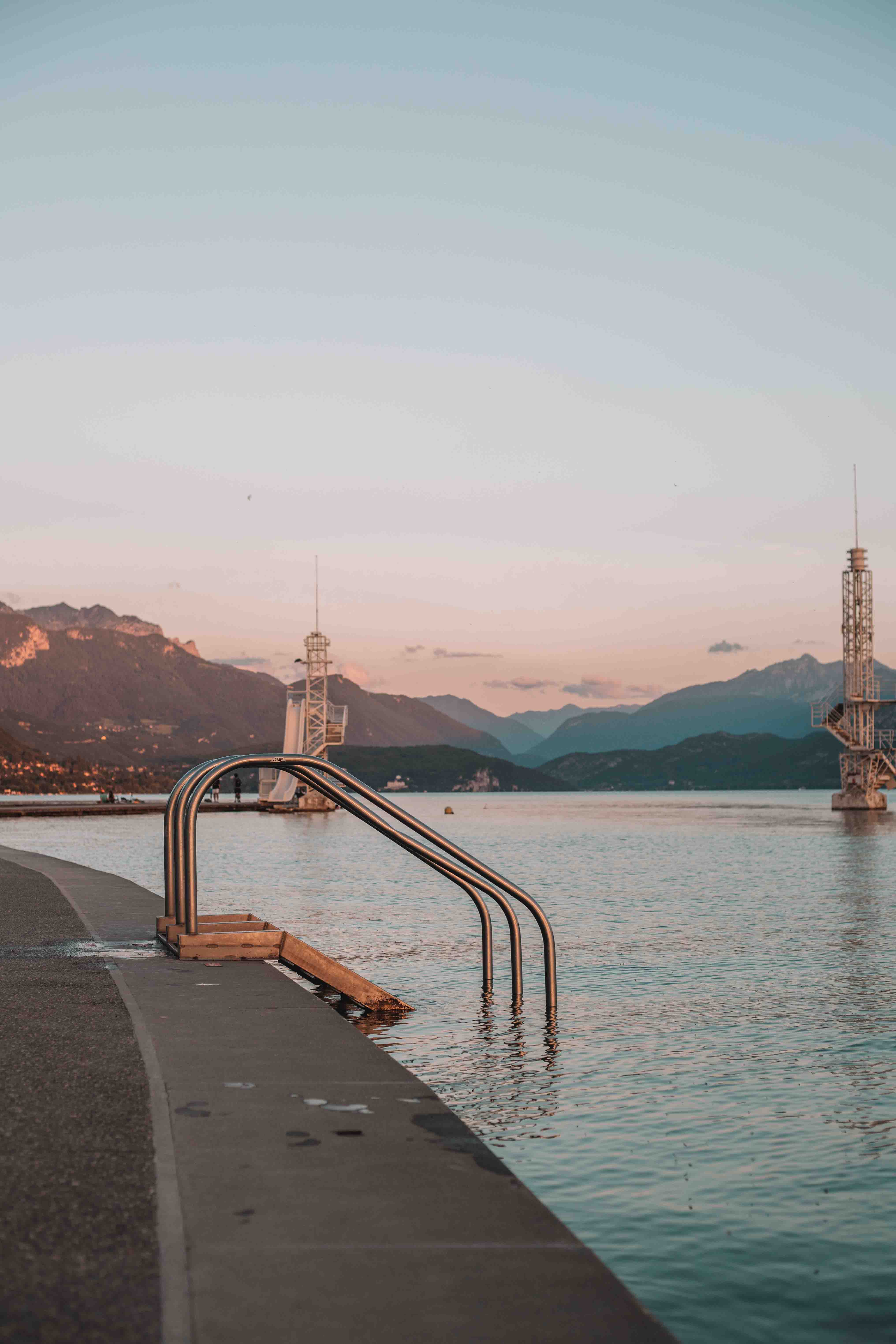 swimming in lake annecy at sunrise