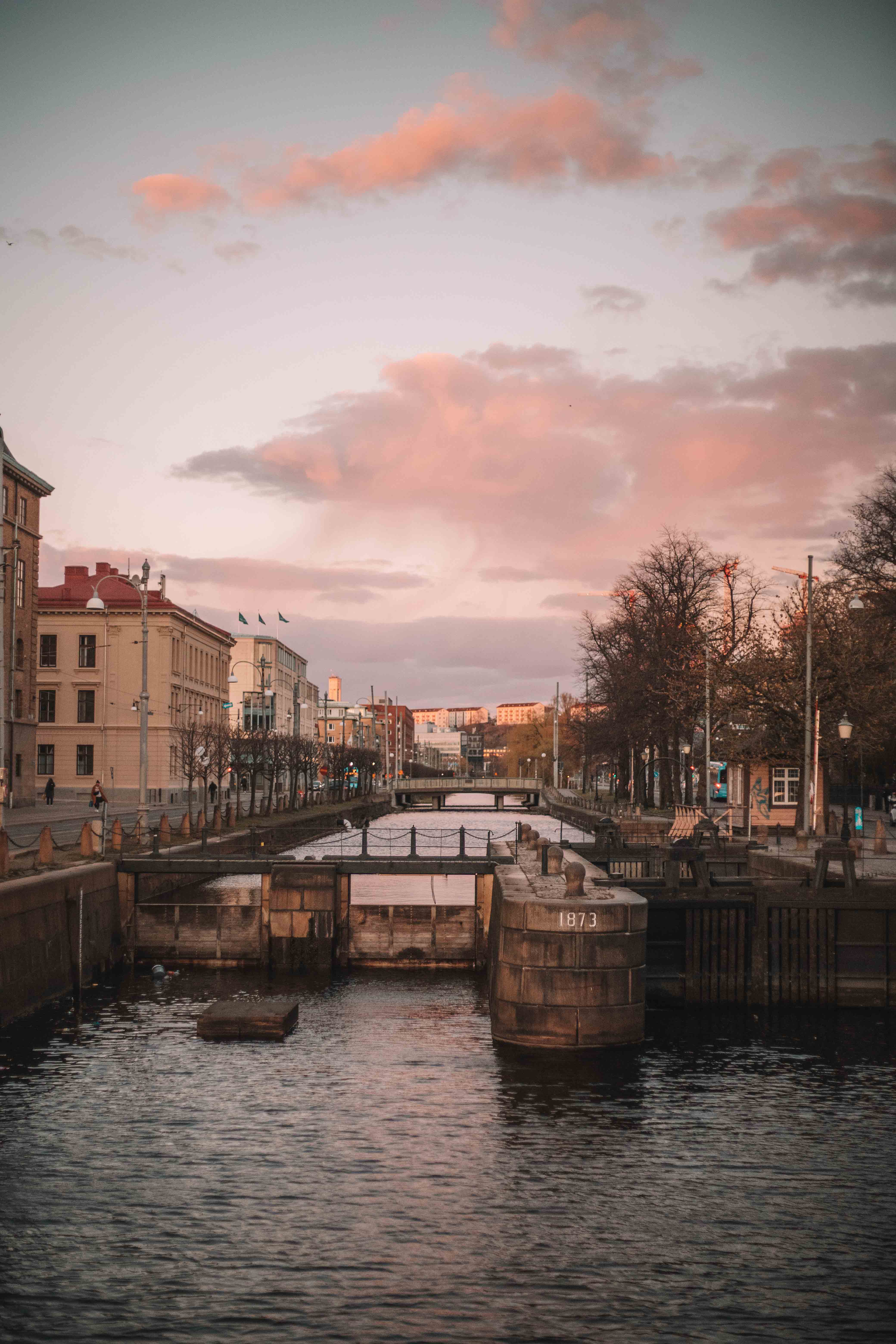 sunset over the canal near central station in gothenburg