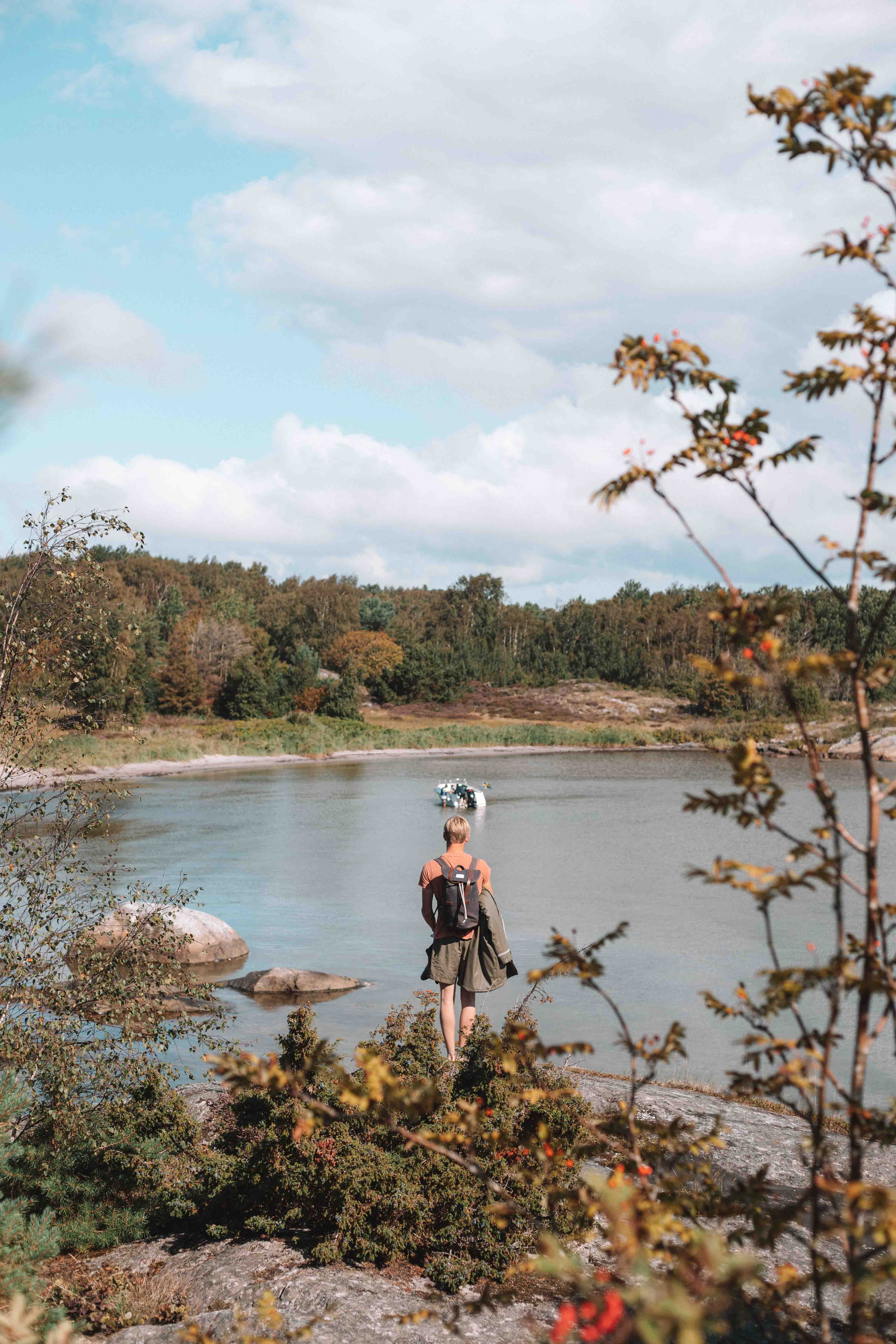 boy standing over the water on vrångö