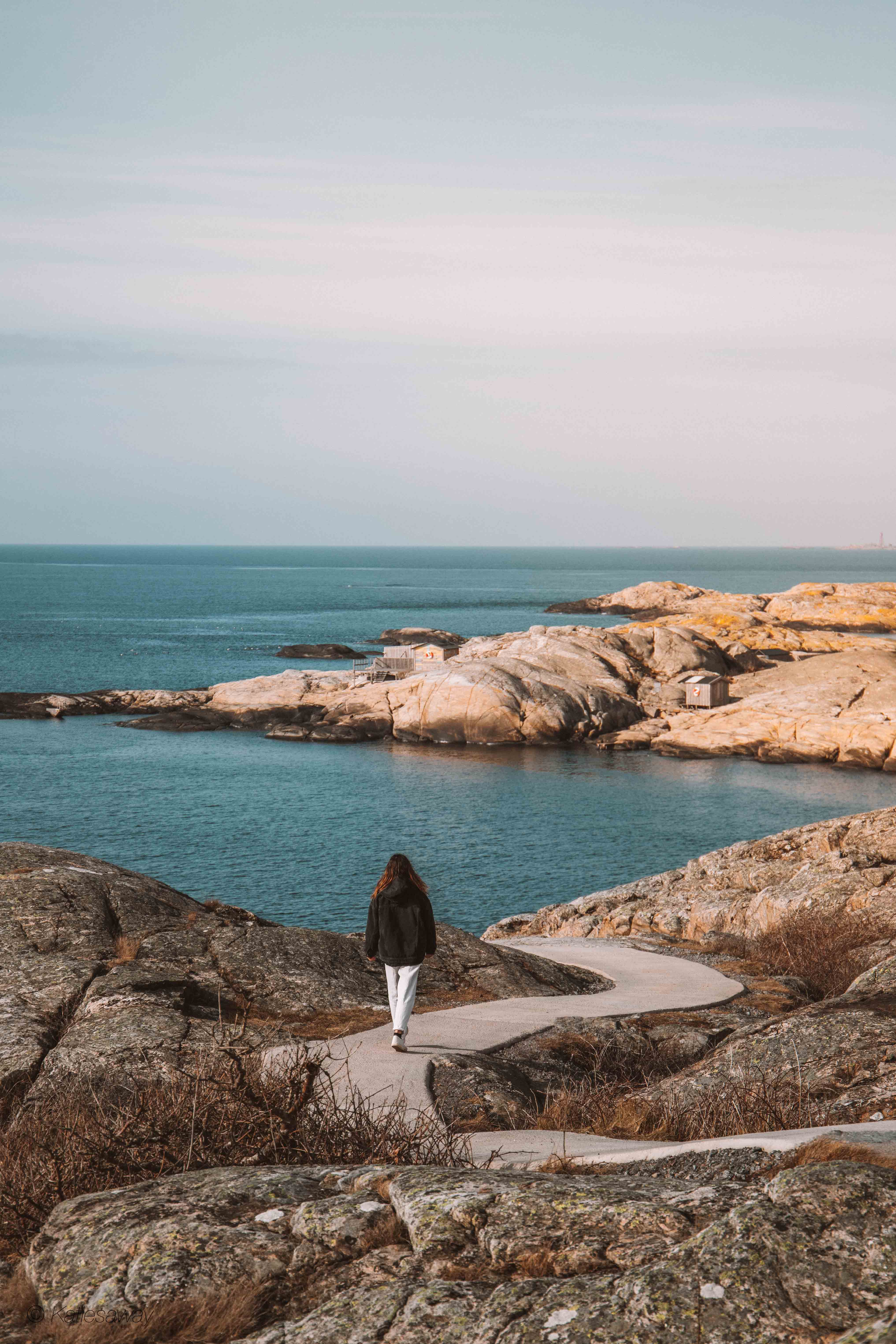 Girl walking along the naturstig on Marstrand