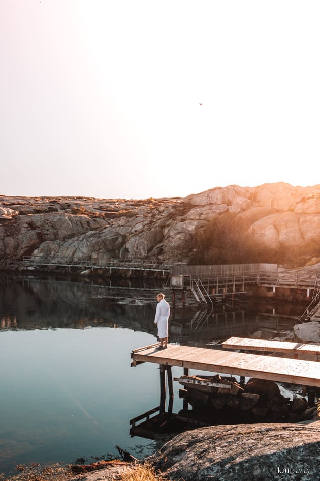 man standing on a dock in smögen in summer