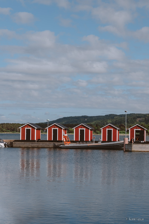 Båstad harbour red boat houses