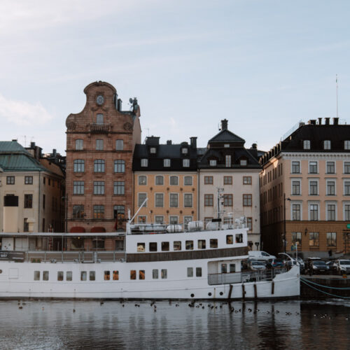 Archipelago cruise boat in Stockholm harbour with old town behind